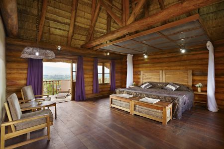 Kyaninga Lodge Bedroom with scenic view of neighbouring villages