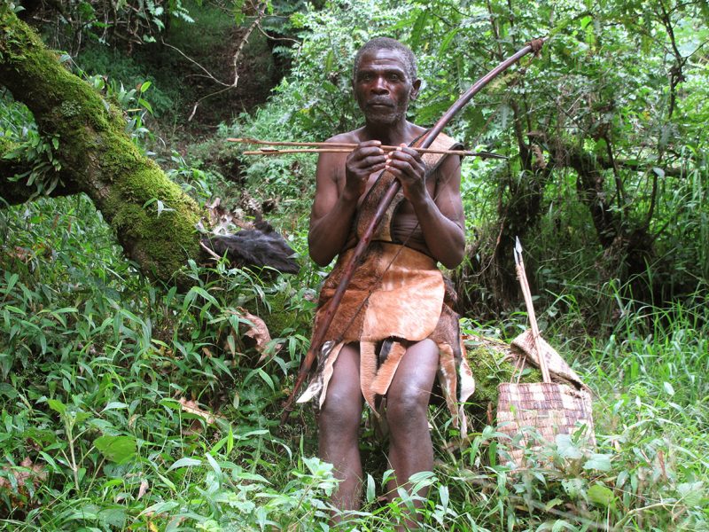 Batwa hunter in the forest.