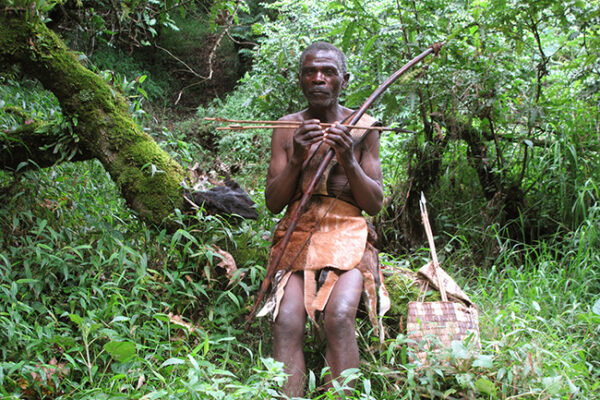 batwa-hunter-in-the-forest-Venture-Uganda Batwa hunter one of the Batwa tribe on a safari with Venture Uganda