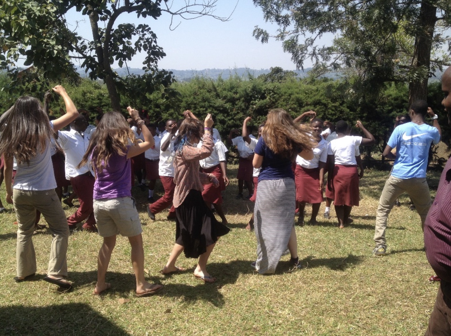 School students learn traditional dancing at a partner school